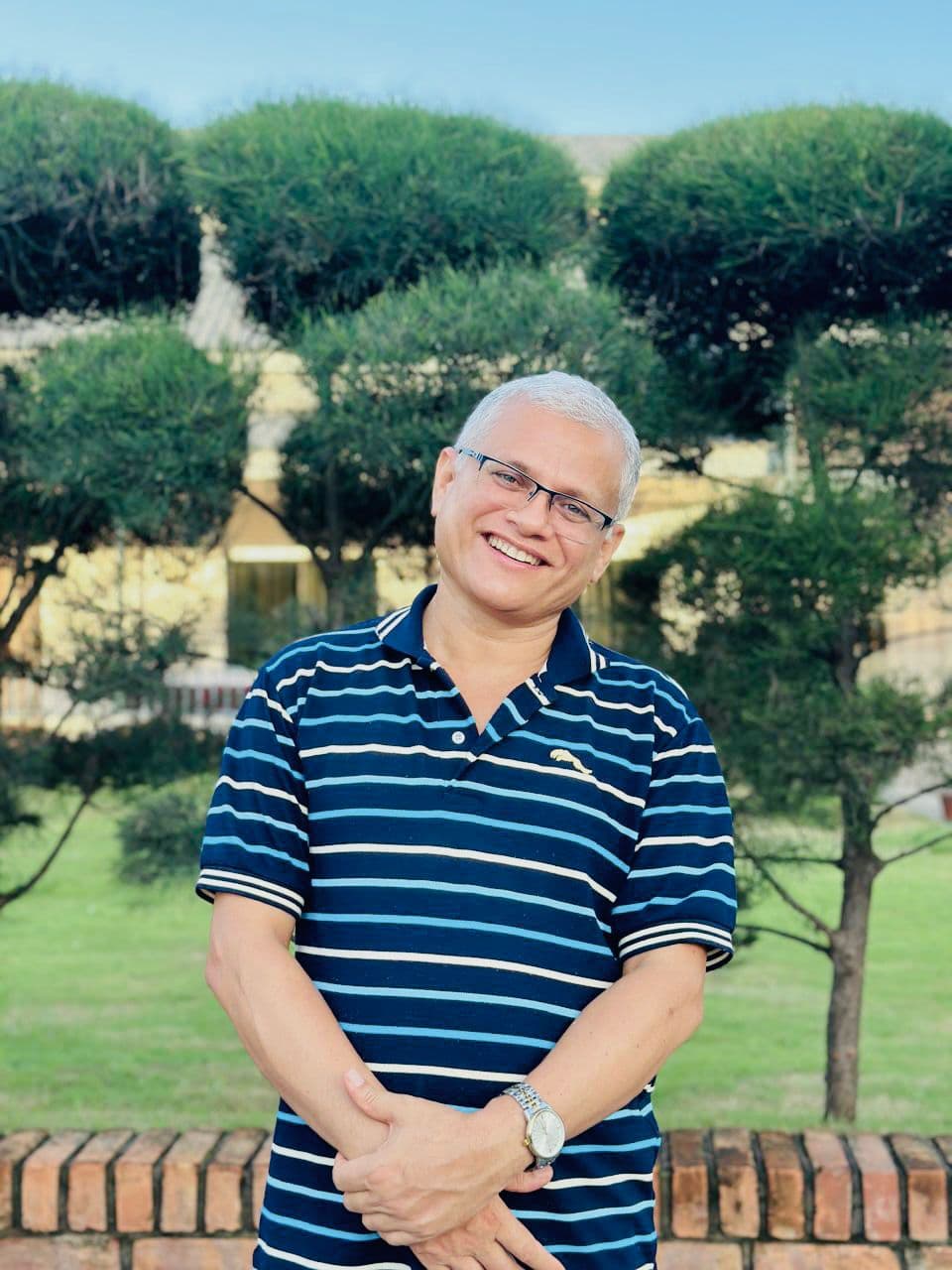 Professional portrait of Paban Kumar Adhikari